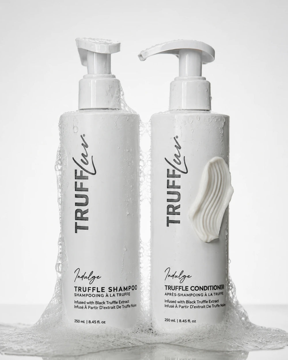TruffLuv Truffle Shampoo and Conditioner duo infused with black truffle extract, studio product shot