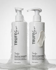 TruffLuv Truffle Shampoo and Conditioner duo infused with black truffle extract, studio product shot